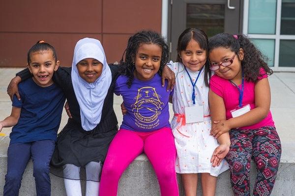 Students smile for a photo