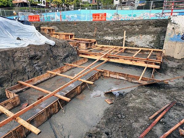 wood forms set into the ground