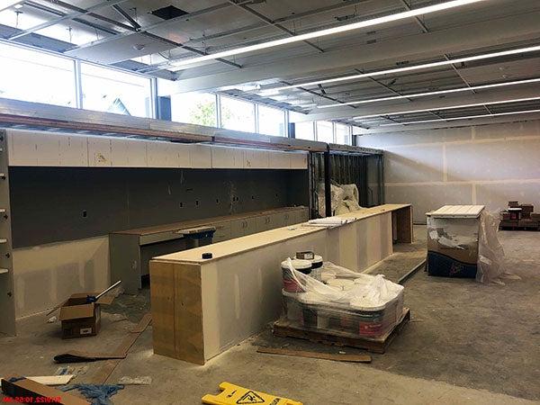 a room under construction with some cabinets