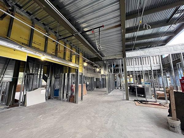 interior of a building under construction with metal framing and metal ceiling