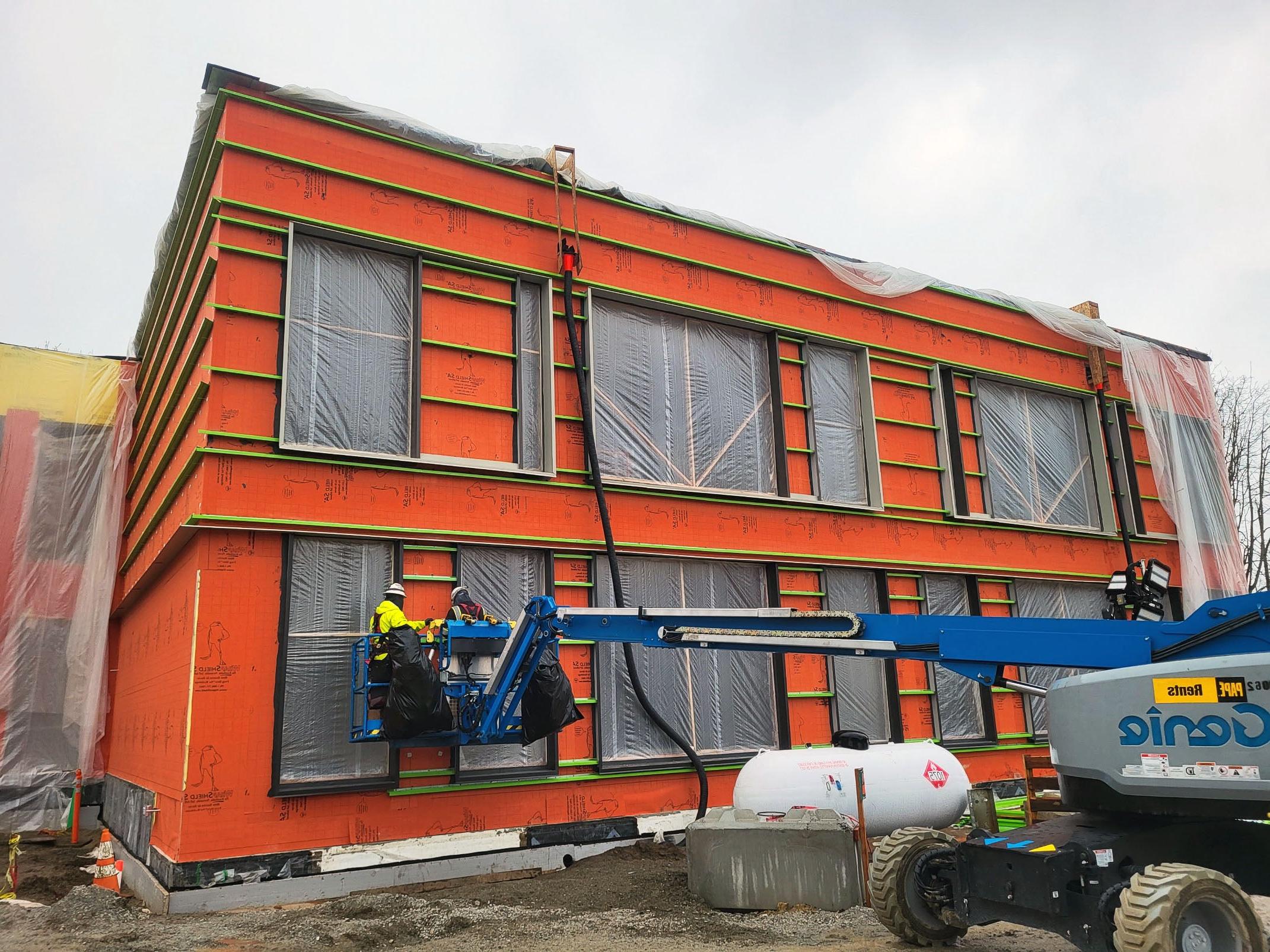 an orange two story building