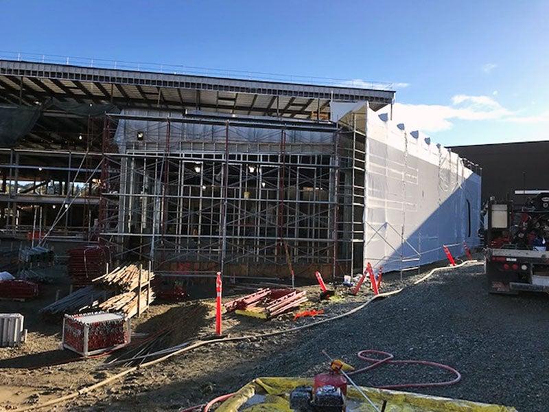 metal framing in progress on a large steel framed building