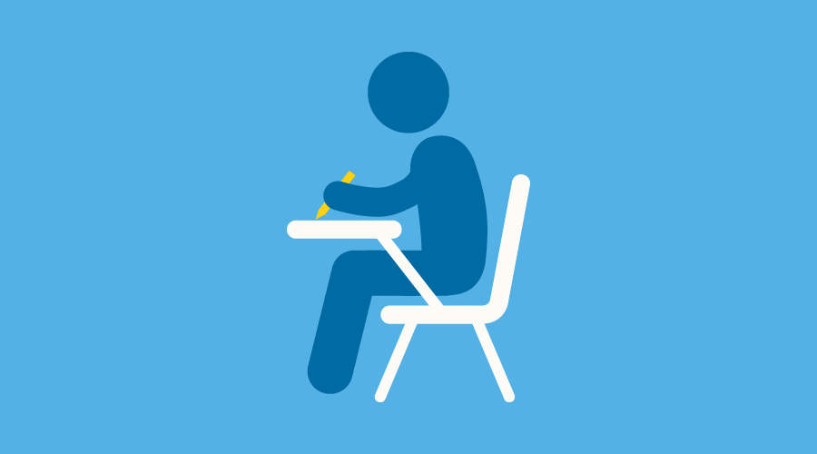 Graphic of a student sitting at a desk and taking a test