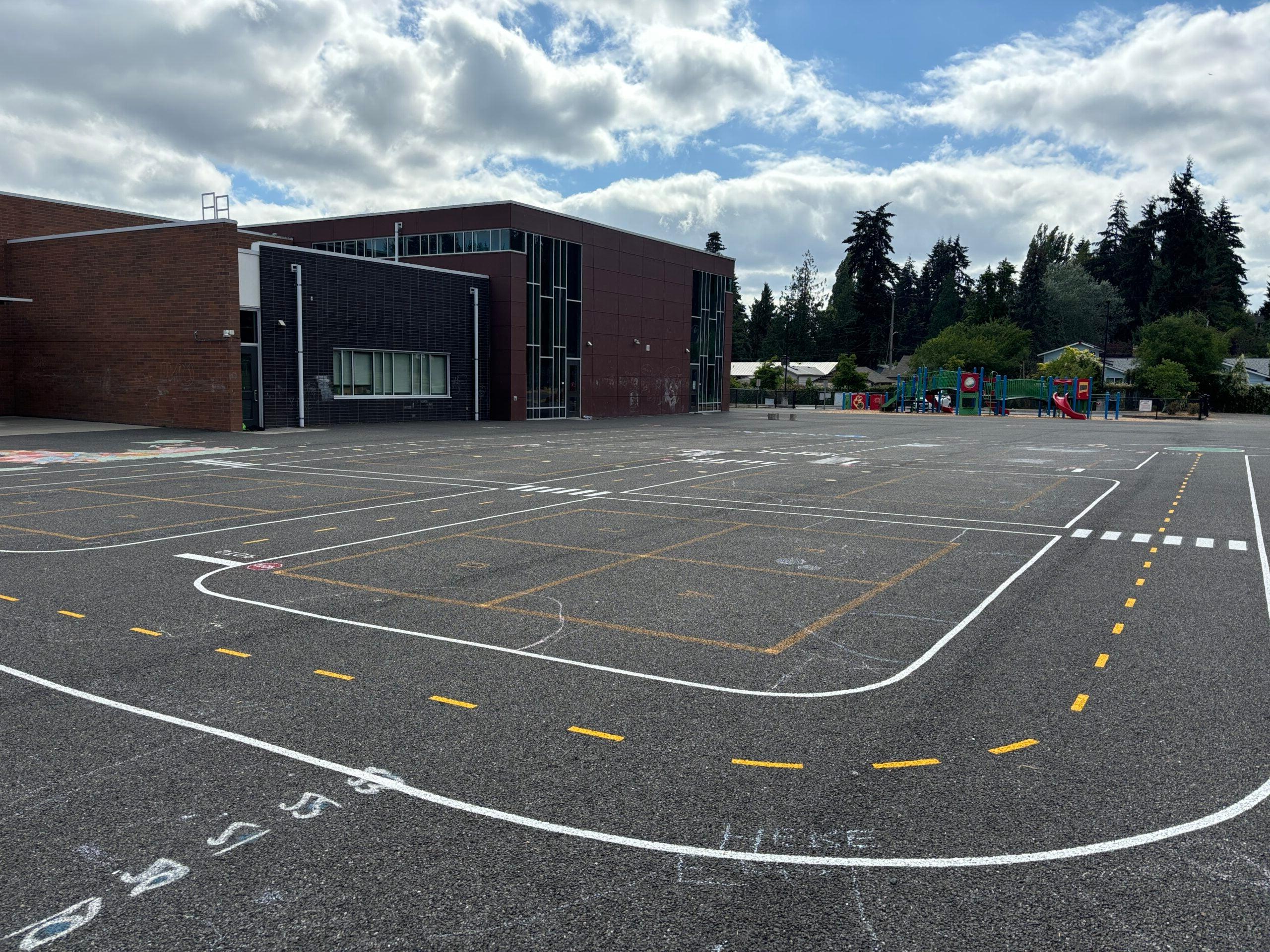 Miniature road painted on blacktop.